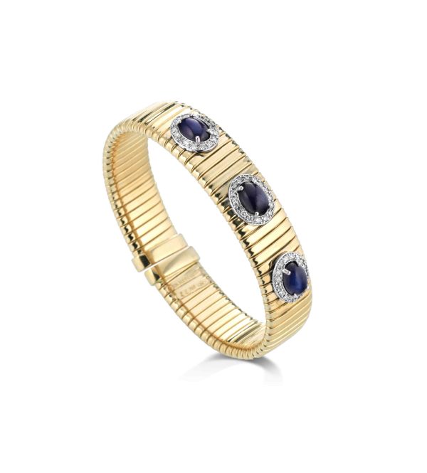 18KT GOLD TUBOGAS BRACELET WITH SAPPHIRE CABOCHON & DIAS