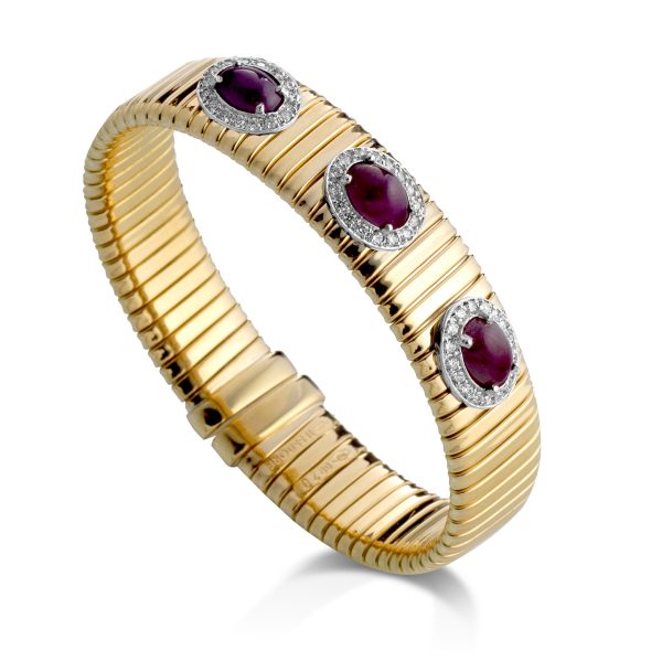 18KT GOLD TUBOGAS BRACELET WITH RUBY CABOCHON & DIAS
